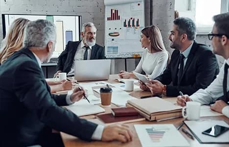Leadership team meeting around a conference table